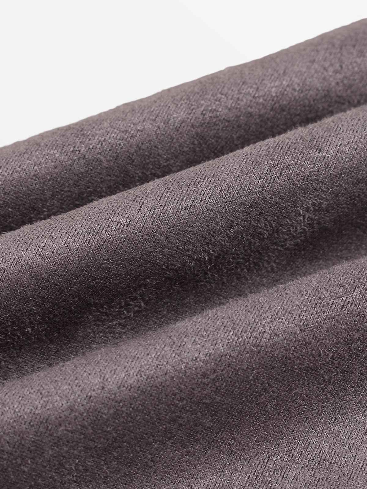 Close-up shot of the 280GSM Titan-Jersey weave and velvet-stroke print detail