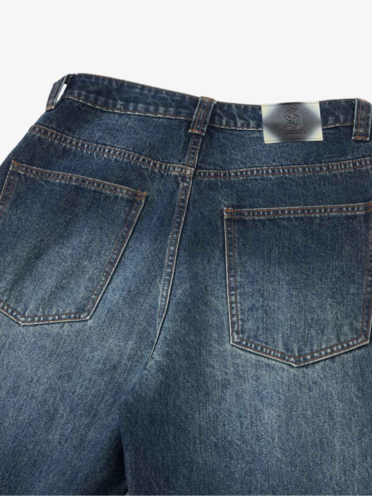 Distressed Whiskered Barrel Jeans