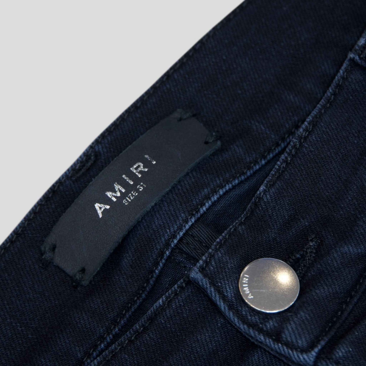 Amiri MX1 Thrashed Denim in Aged Black