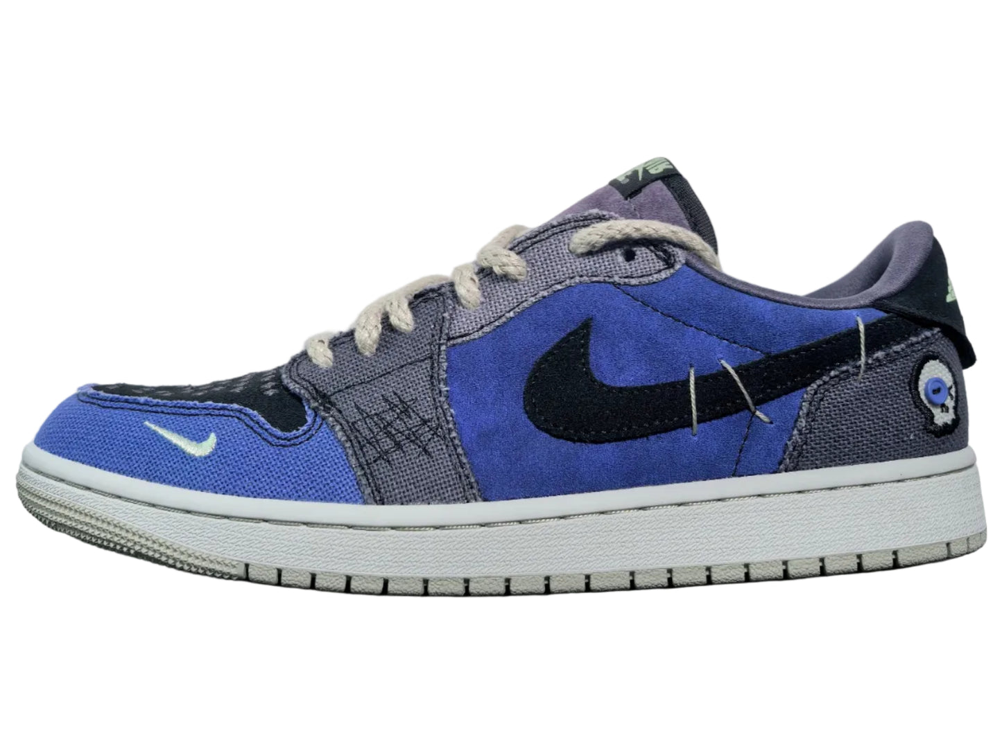 Luxuryurbanwear designer sneaker in blue, grey, and black with skull detail, urban street style