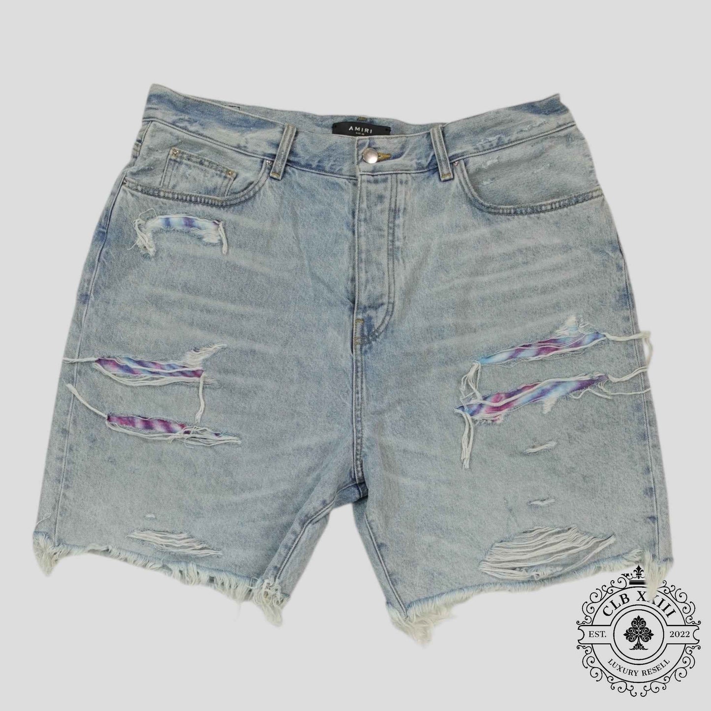 Amiri Tie Dye Thrasher Jean Shorts in Light Wash