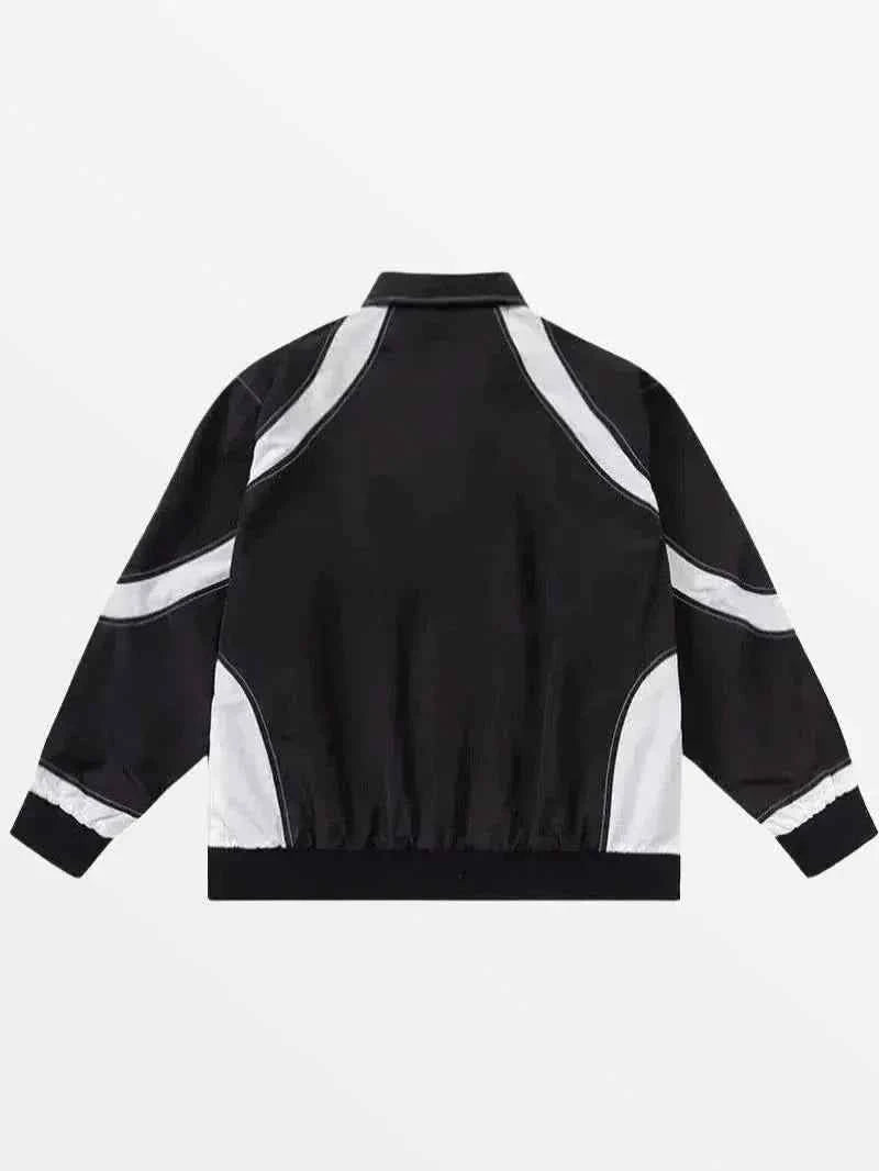 Front view of model wearing Jacket Disparate showing asymmetrical spliced panels