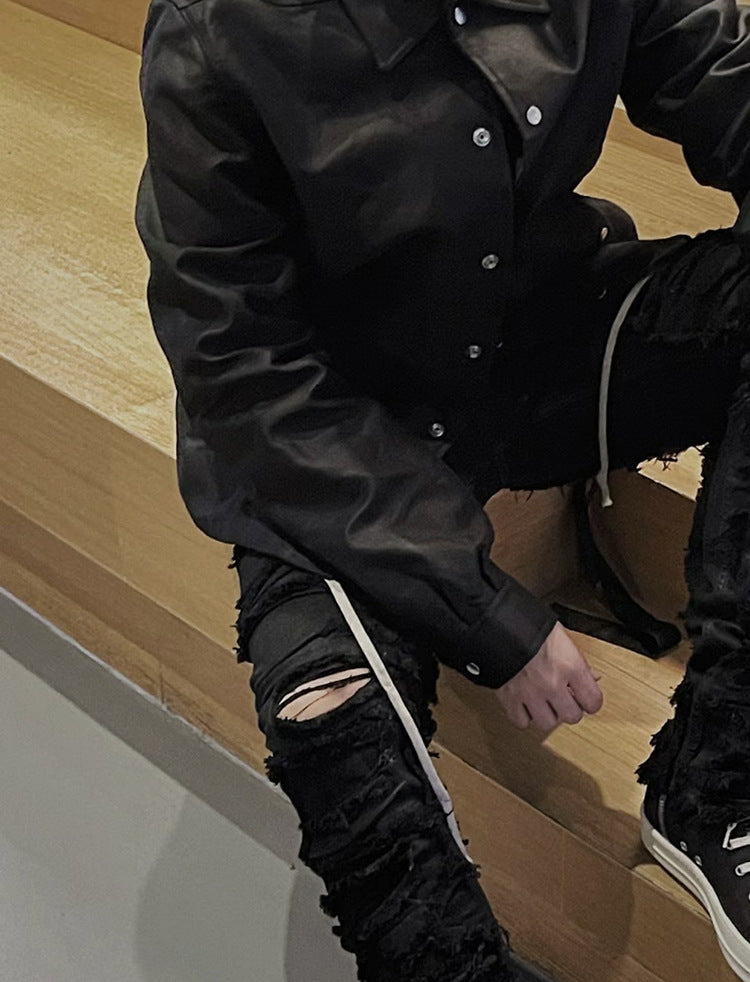 Dark Coating Waxed Distressed Jeans