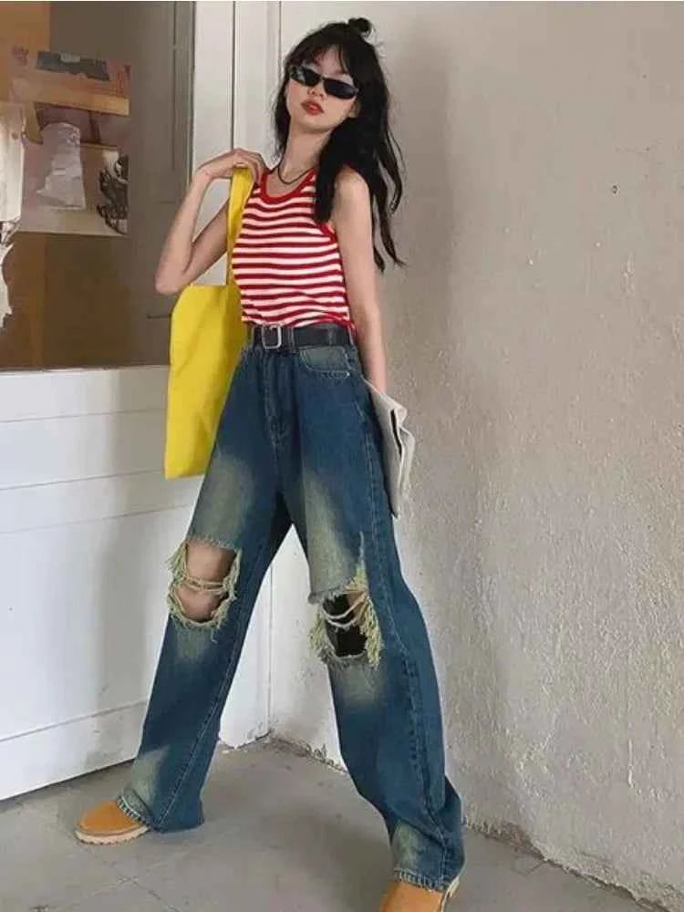 Women Cutting Cool Vintage Ripped Jeans