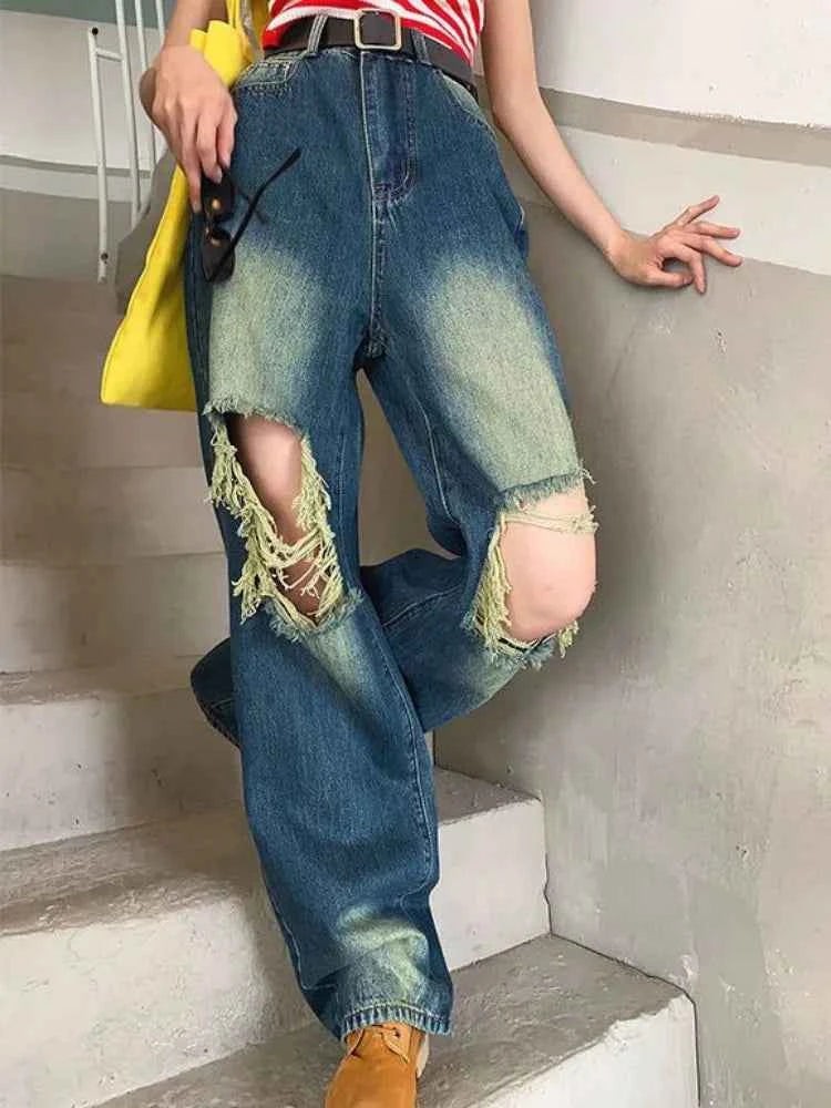 Women Cutting Cool Vintage Ripped Jeans