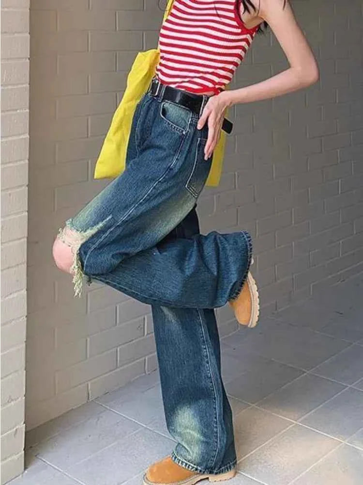Women Cutting Cool Vintage Ripped Jeans