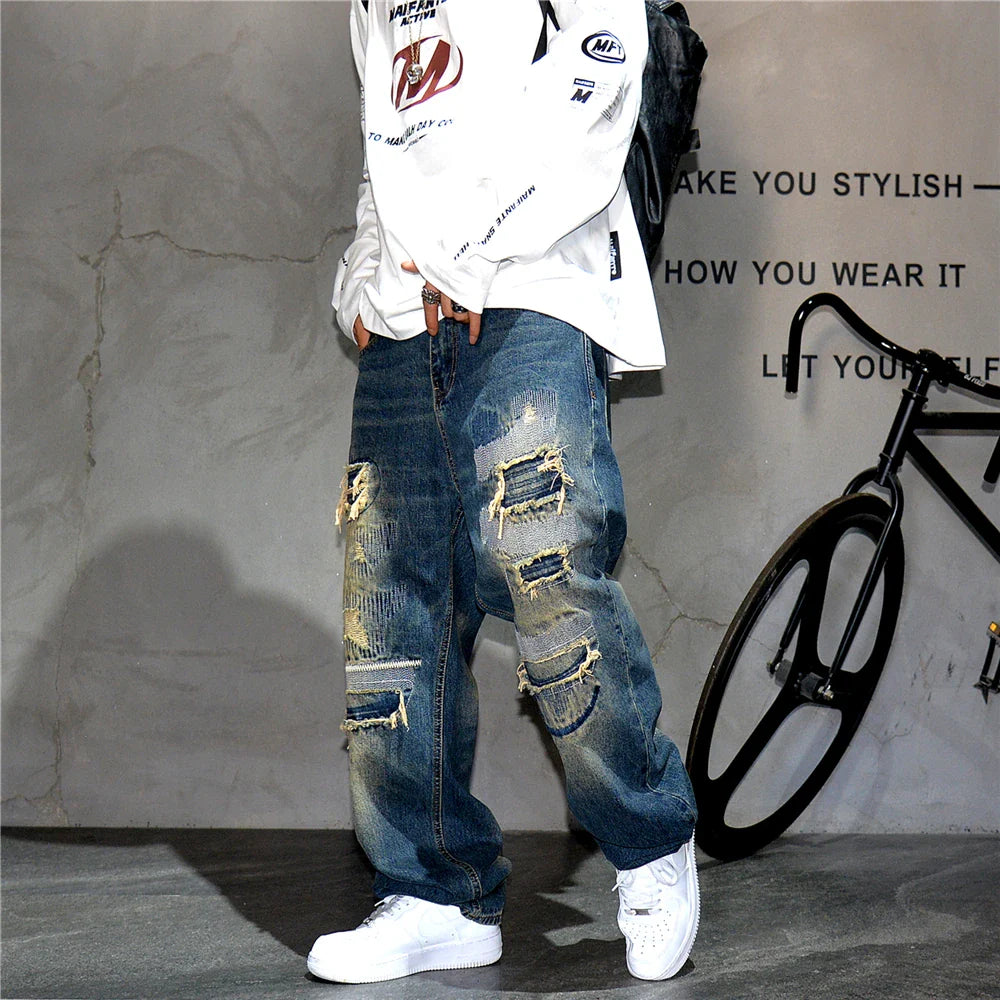 AM26 Ripped Patch Washed Jeans