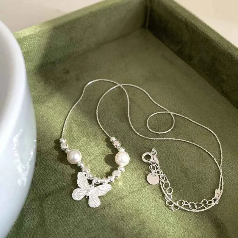 Elegant Sterling Silver Butterfly Pearl Necklace