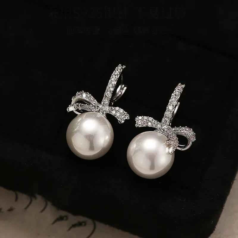 Dazzling Bowtie Ribbon Pearl Clear CZ Errings