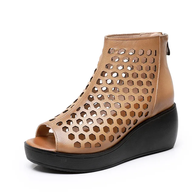 Khaki women's wedge sandal with honeycomb cutout upper and black platform sole on white background