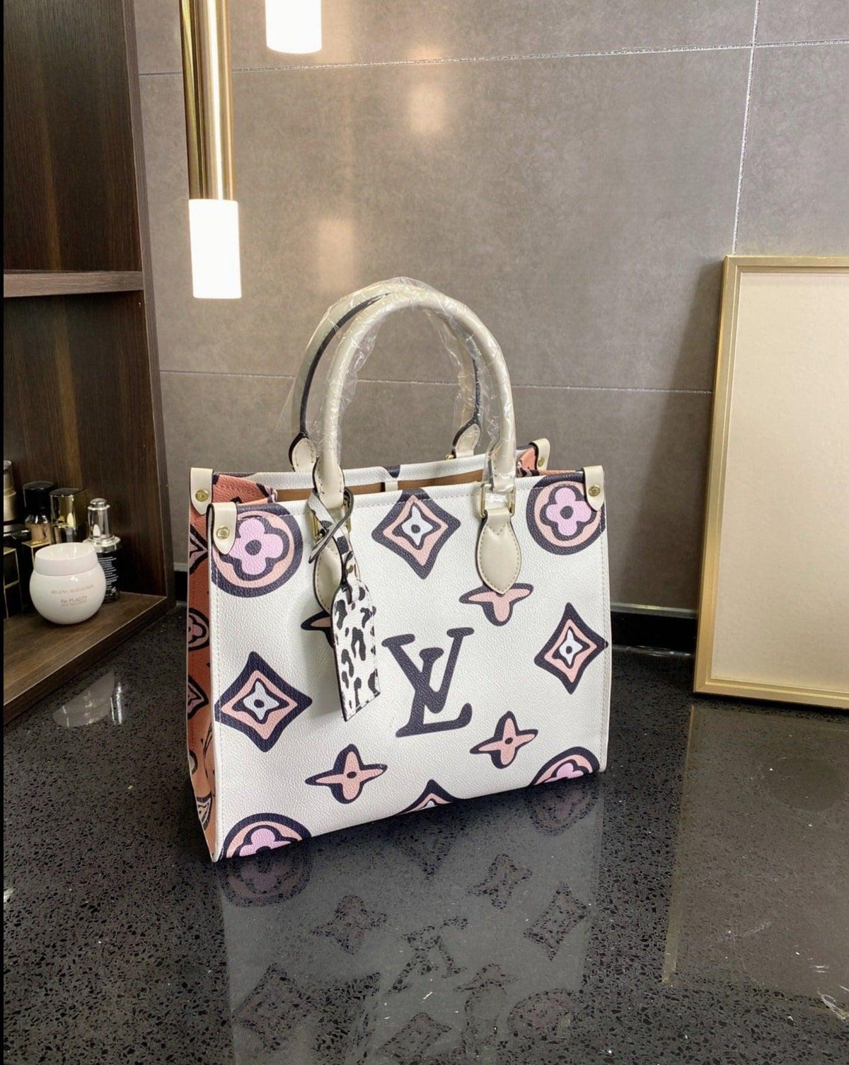 LV ONTHEGO MONOGRAM 069 sneakerhypes