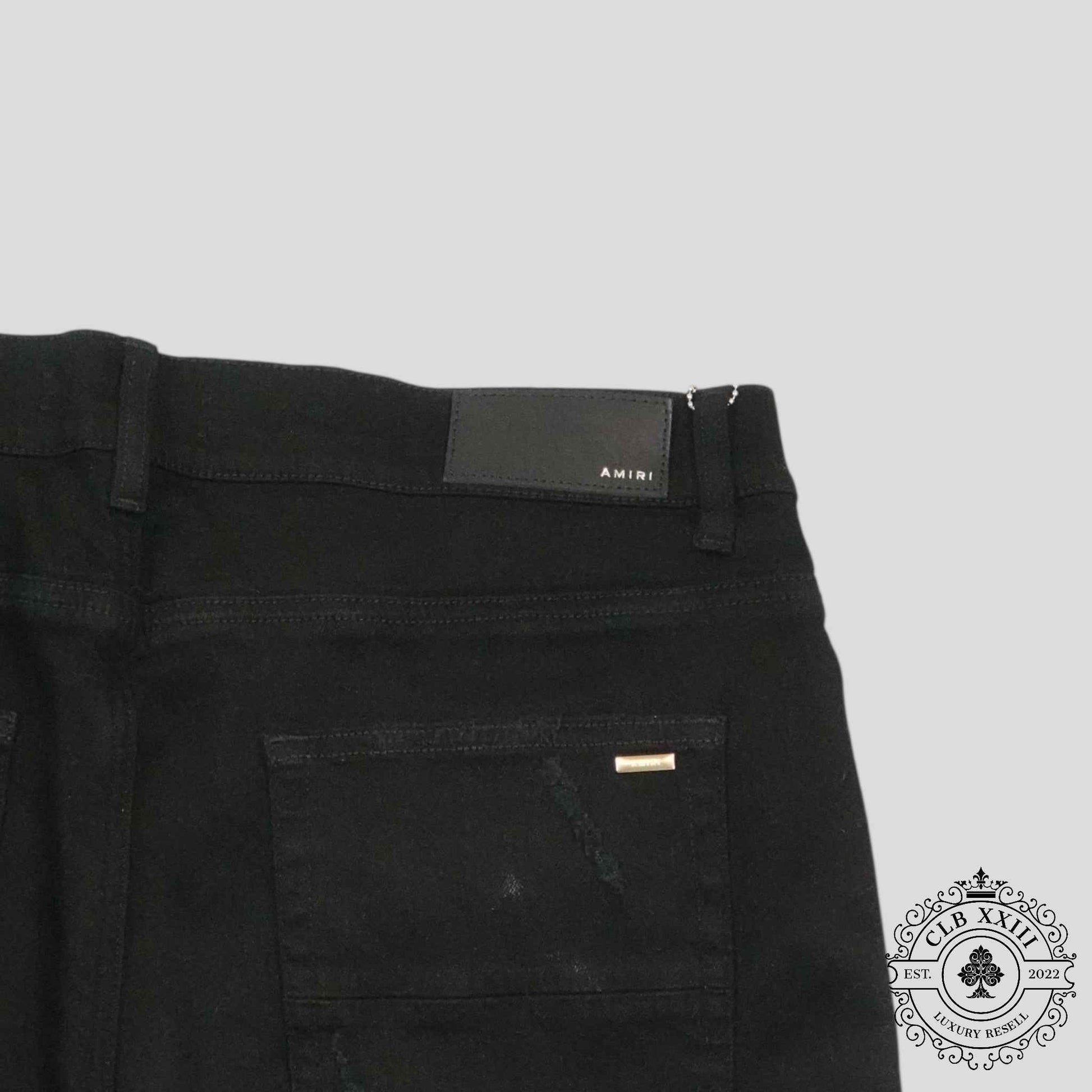 Amiri Banana Leaf Patch Thrasher Jeans in Black