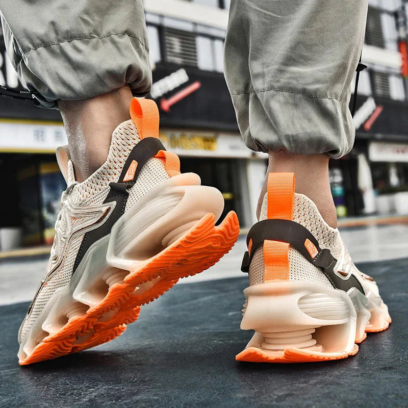 Rear view of Nova Sole T84 Sneakers - LUXURYURBANWEAR in beige and orange, featuring pull tabs and dynamic sole structure.