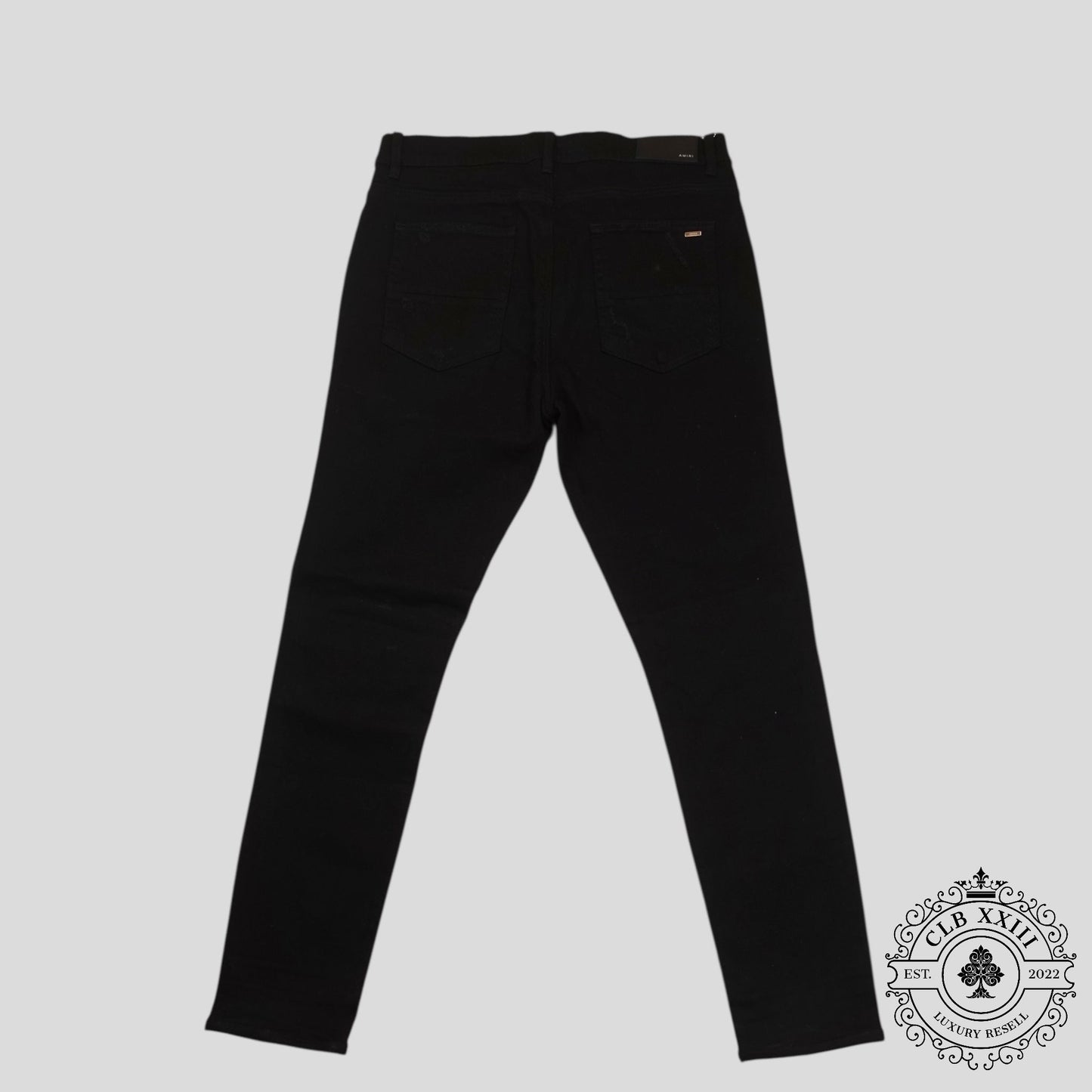 Amiri Banana Leaf Patch Thrasher Jeans in Black