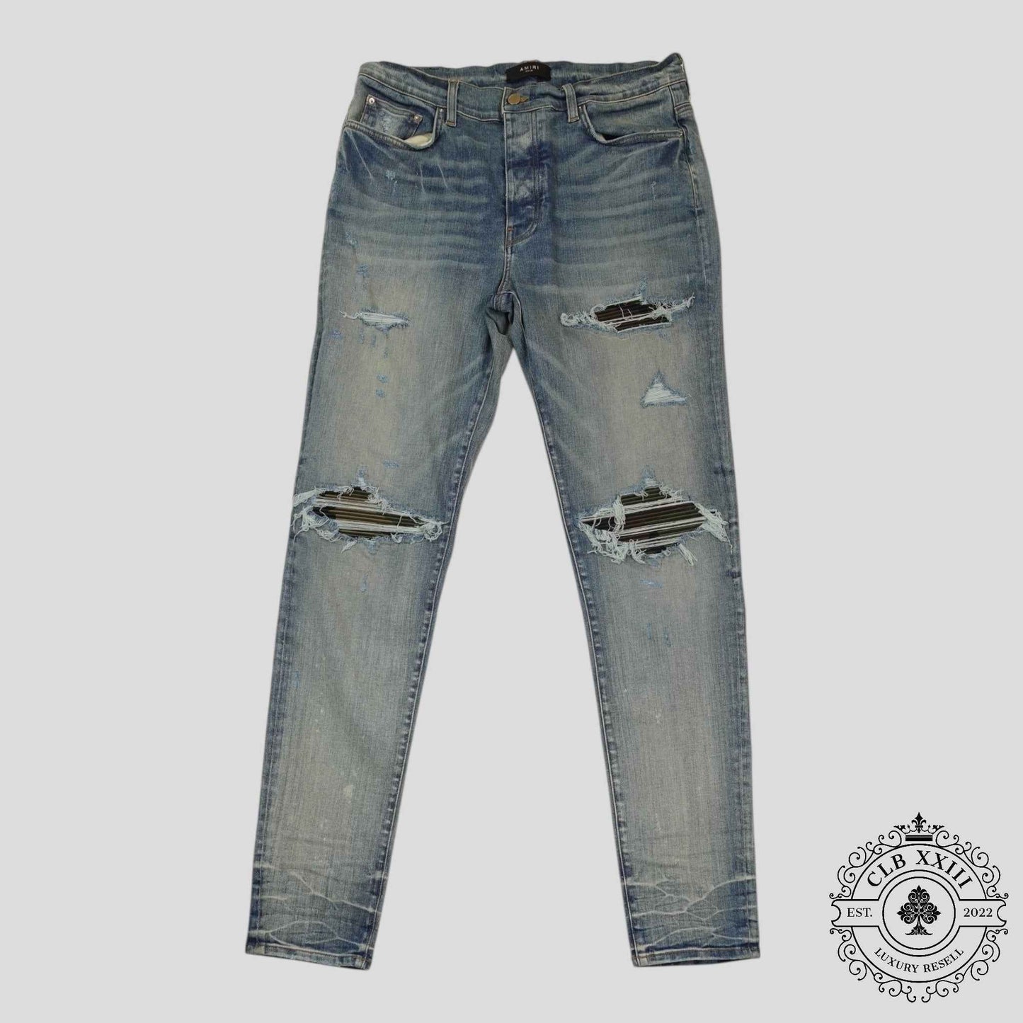 Amiri MX1 Camo Patch Jeans in Clay Indigo