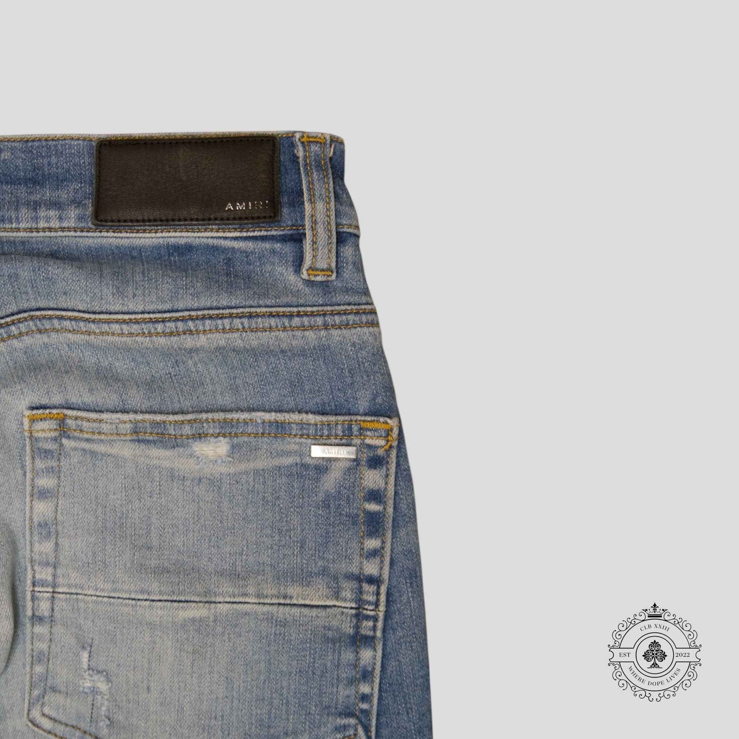 Amiri MX1 Leather Patch Jeans in Light Indigo