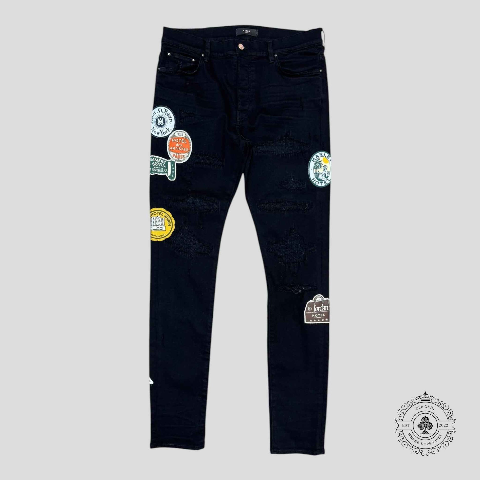 Amiri Travel Patch Repair Jeans in Black