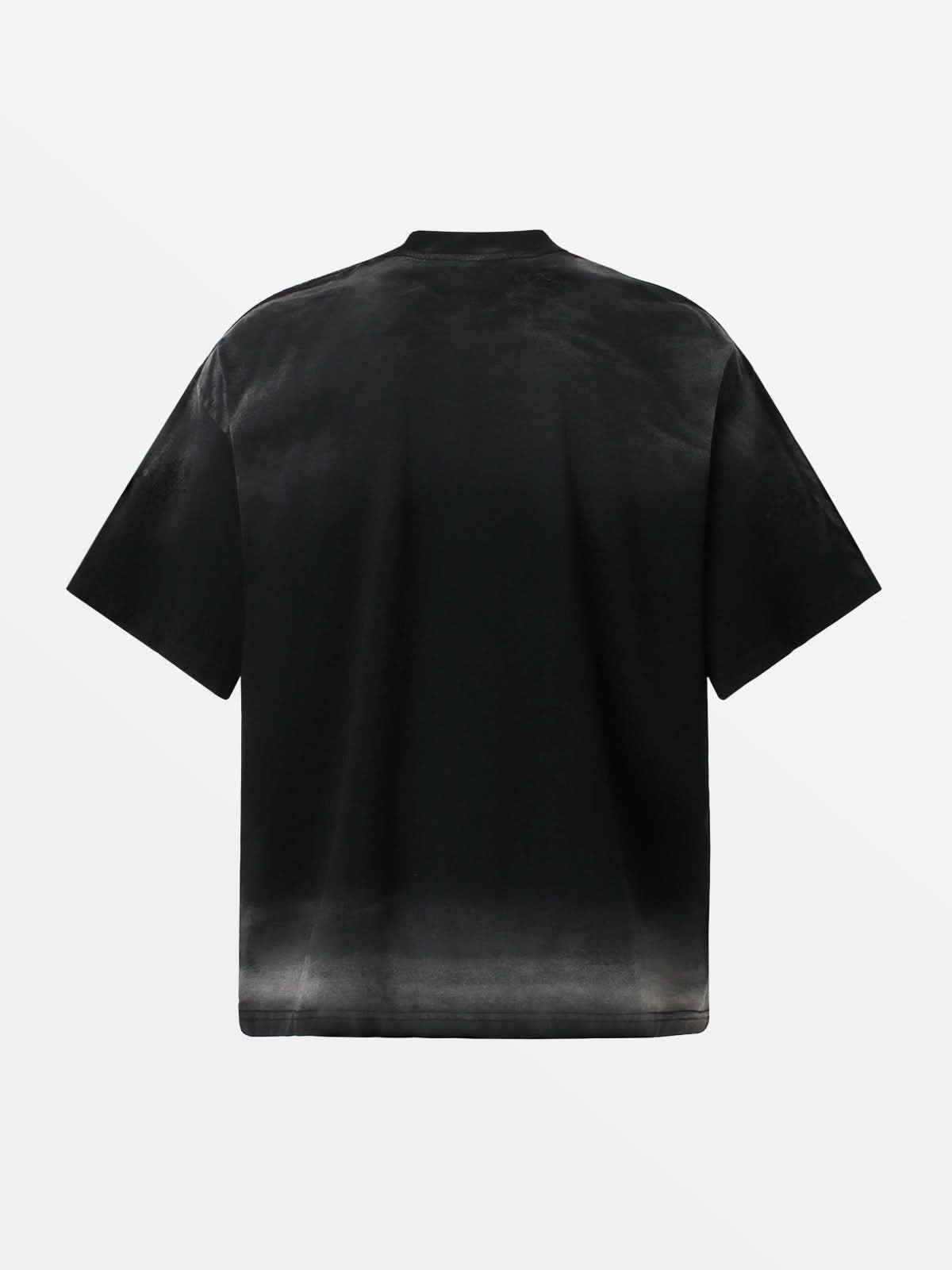 Front view of model wearing Dimadir unisex graphic t-shirt in a boxy oversized fit