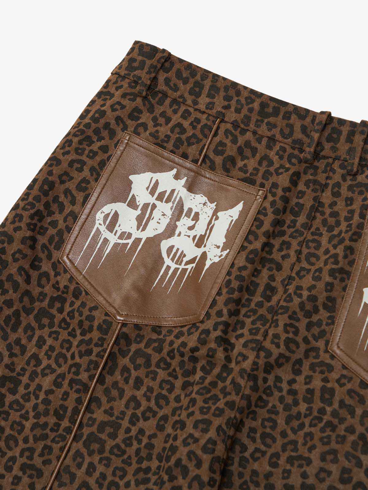 SUPM Graffiti Print Leather Leopard Print Baggy Pants