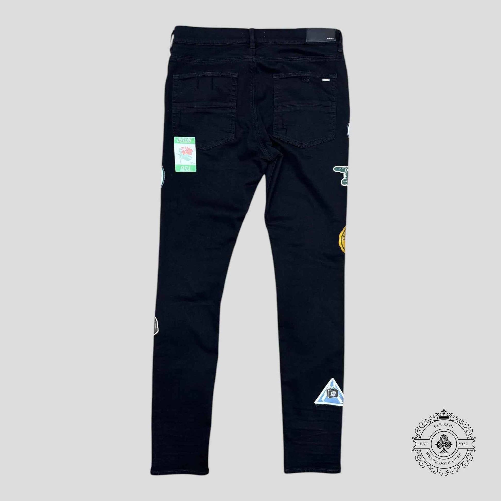 Amiri Travel Patch Repair Jeans in Black