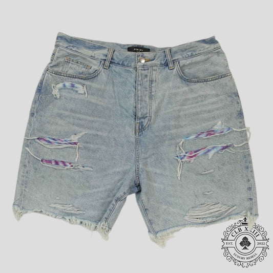 Amiri Tie Dye Thrasher Jean Shorts in Light Wash
