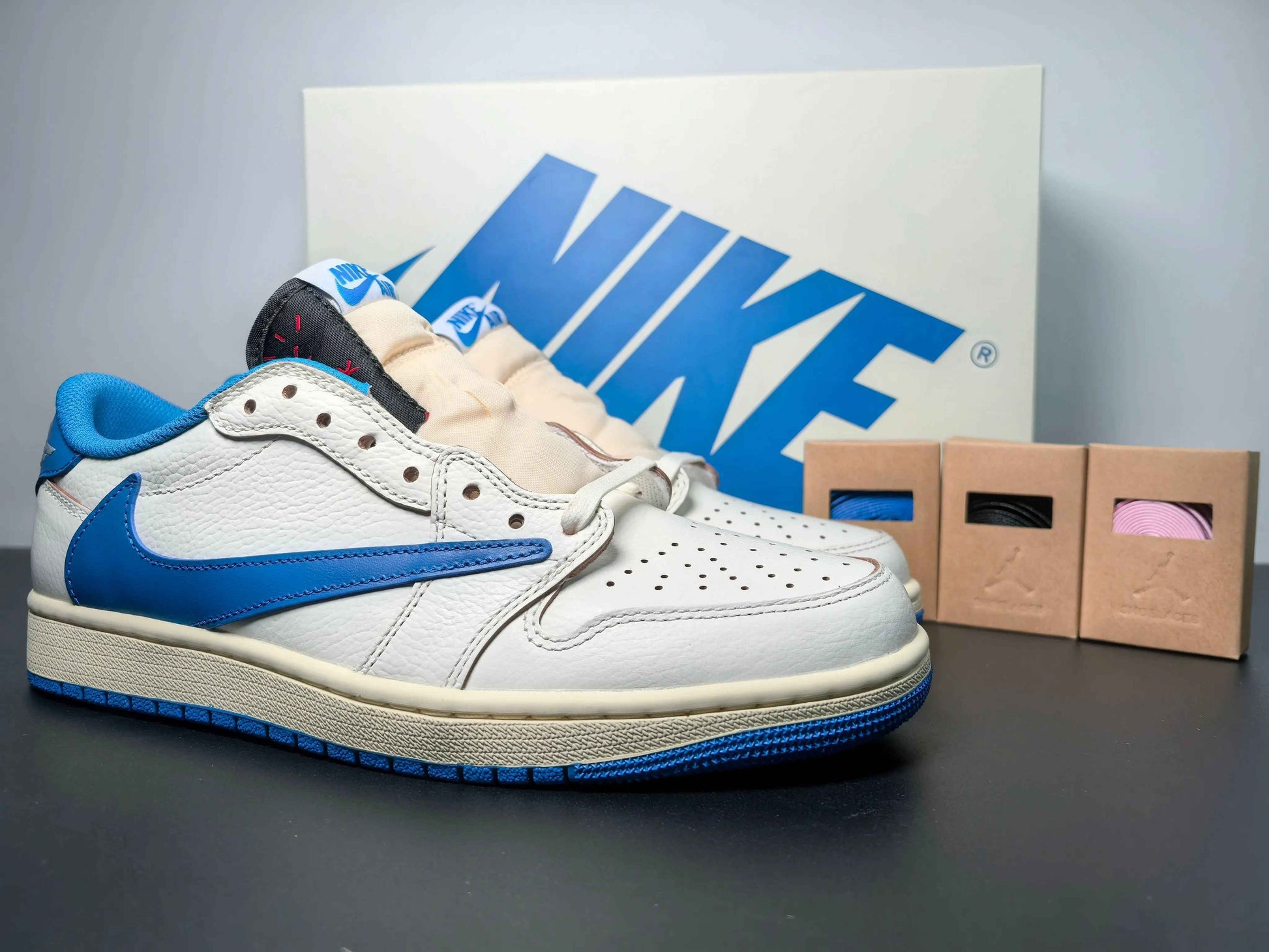 Custom white and blue Air Jordan 1 low-top sneakers with extra laces, luxury urbanwear style