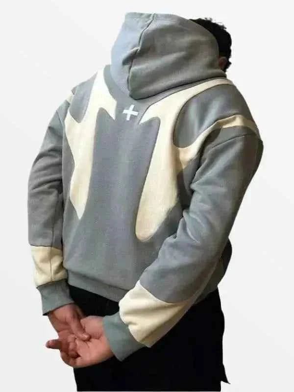 Front view of model wearing the Hoodie Handma in a massive, sculptural oversized fit