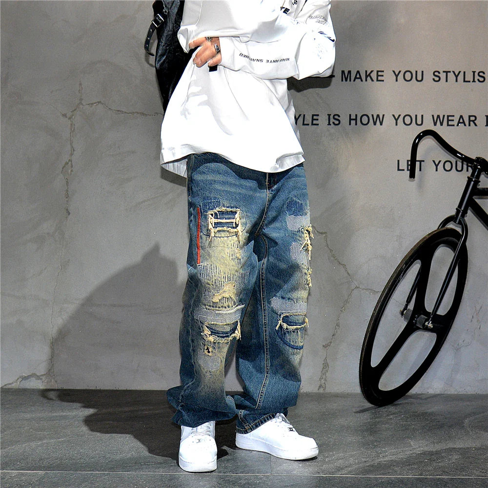 AM26 Ripped Patch Washed Jeans