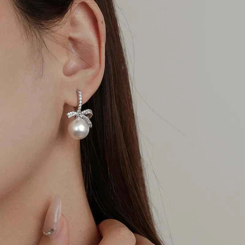 Dazzling Bowtie Ribbon Pearl Clear CZ Errings