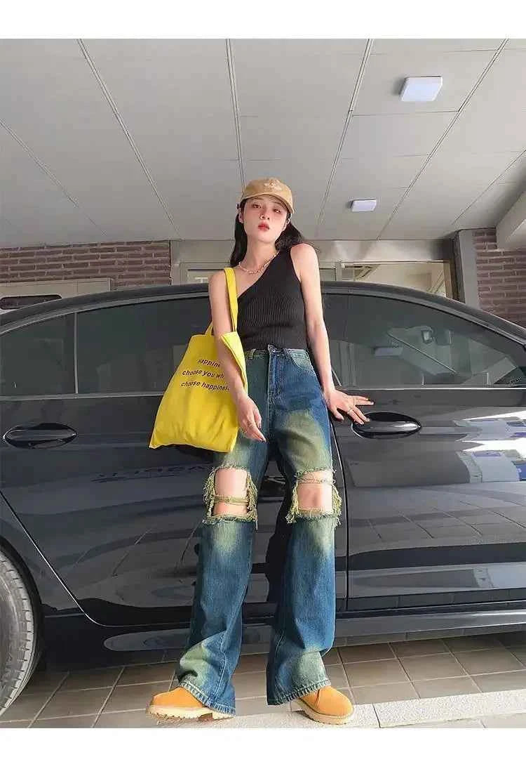 Women Cutting Cool Vintage Ripped Jeans