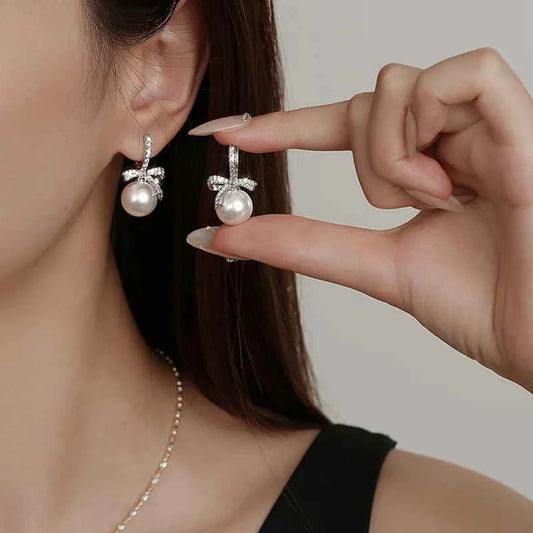 Dazzling Bowtie Ribbon Pearl Clear CZ Errings