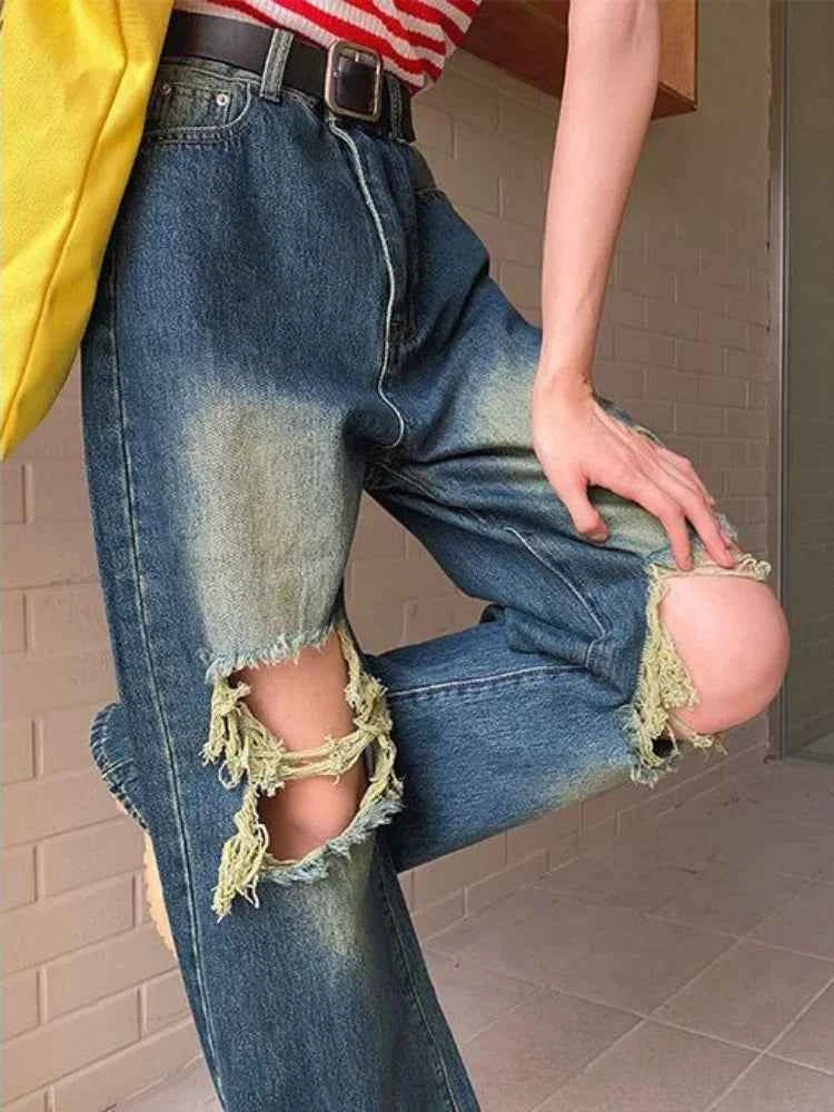Women Cutting Cool Vintage Ripped Jeans