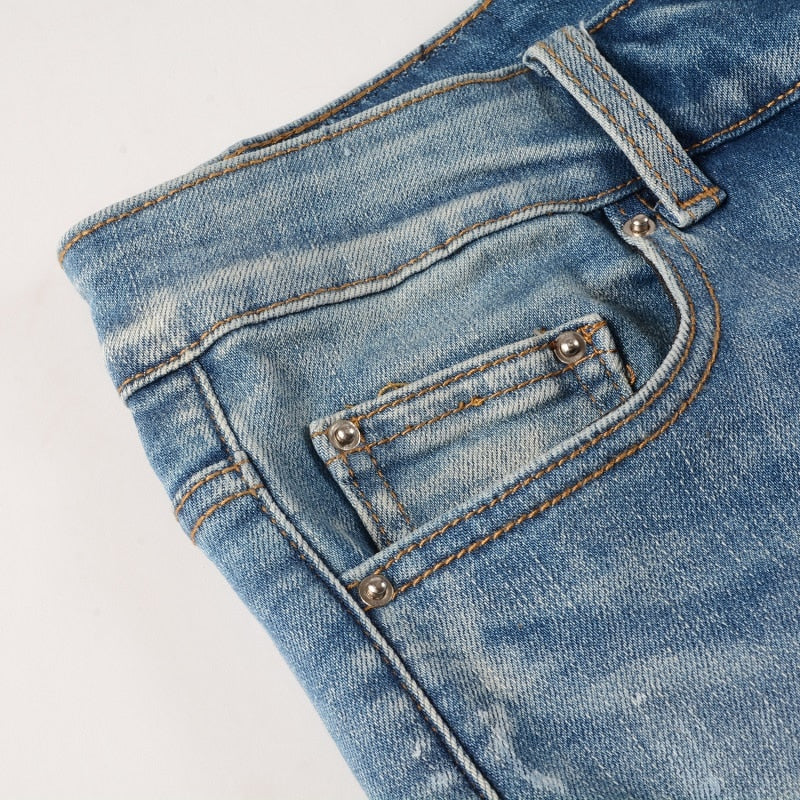 Sapphire Distressed Rhinestone Slim Jeans