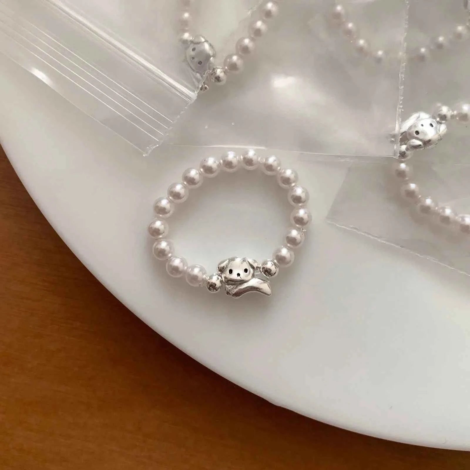 Elegant Sterling Silver Pearl Dog Ring