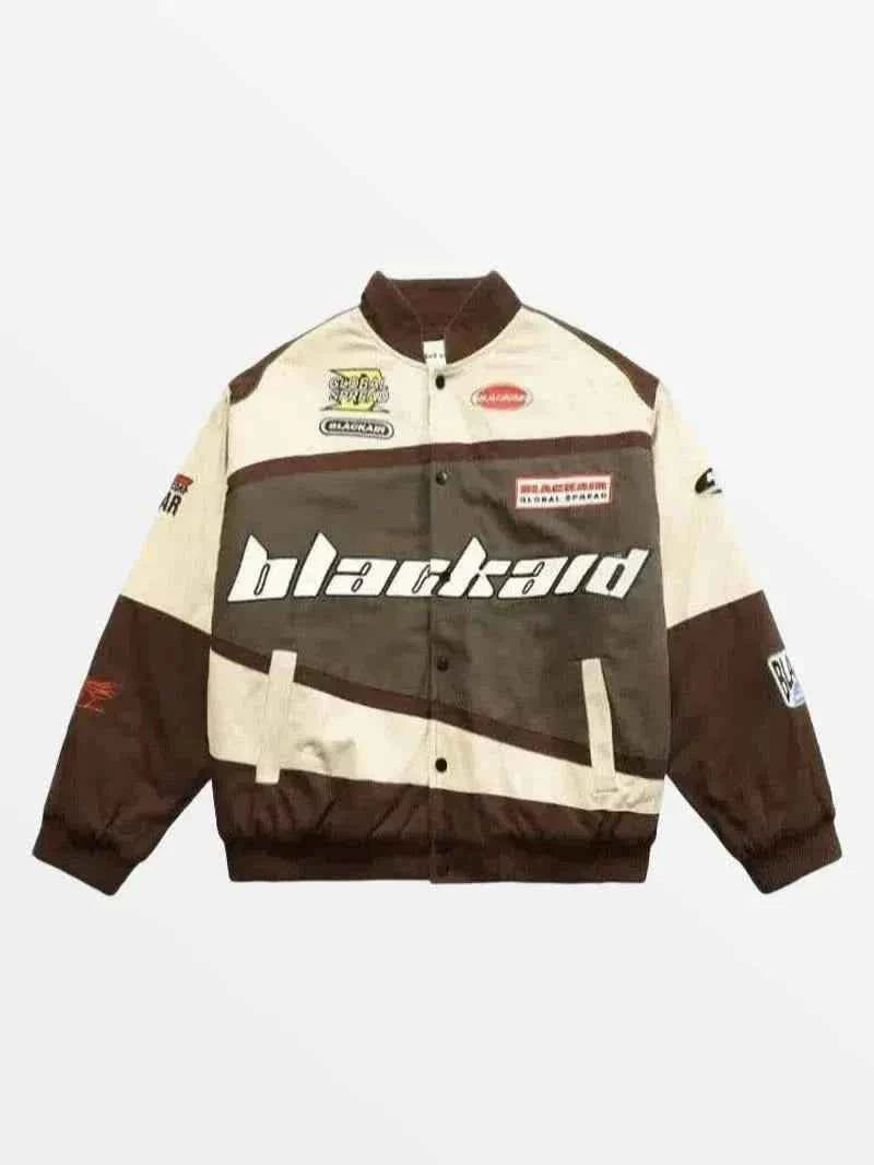 Front view of model wearing Jacket Blackaid in an all-black urban techwear outfit