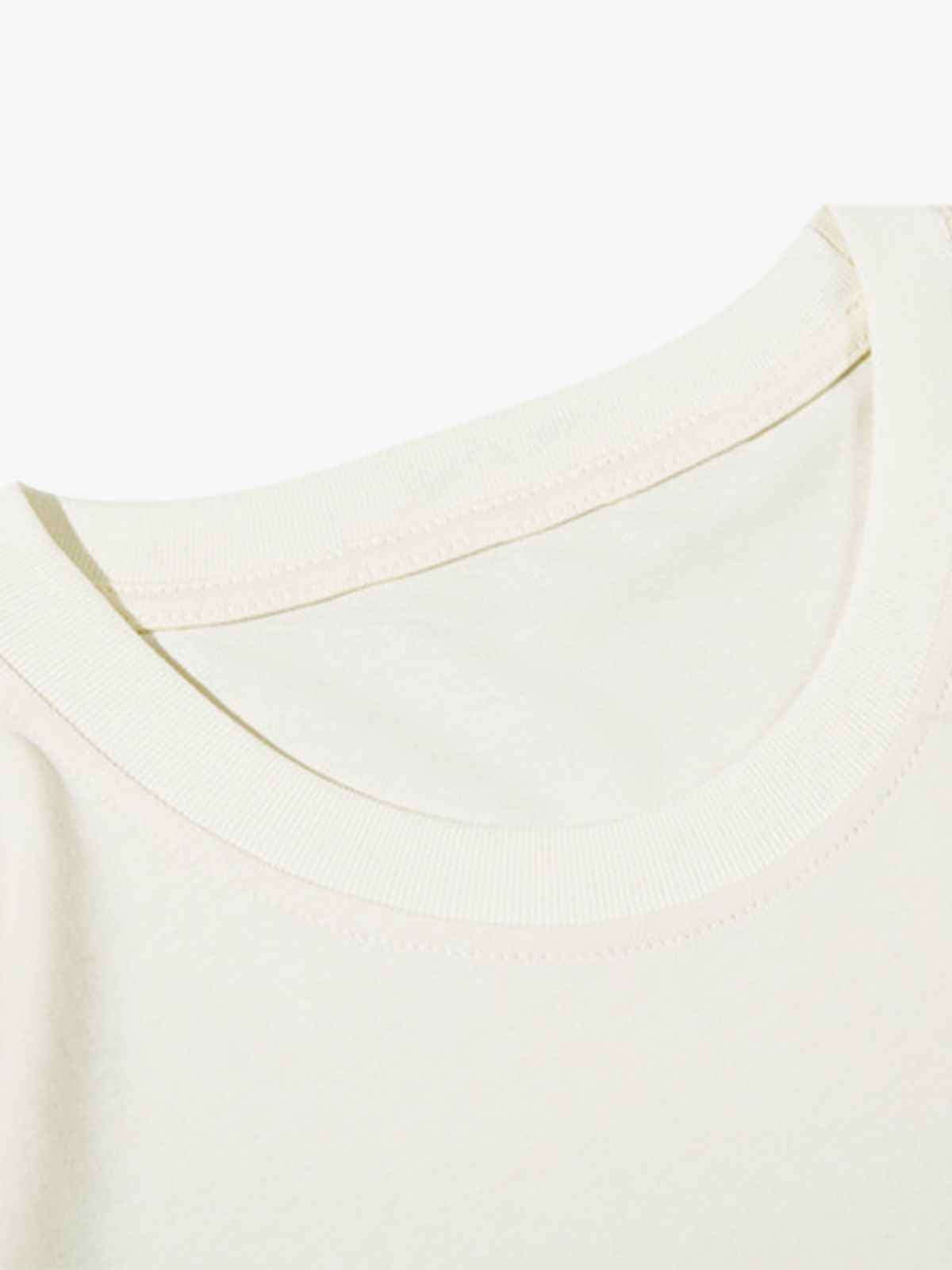 Front view of model wearing unisex oversized t-shirt with pixel art cartoon character