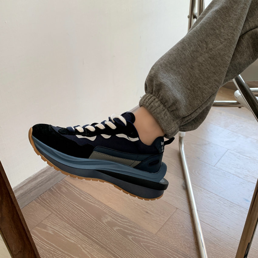 Women's round toe black and navy lace-up sneaker with thick sole, luxury urban streetwear style