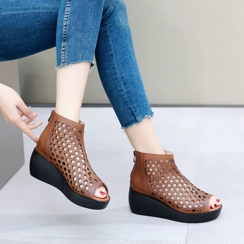 Women's summer wedge sandals with brown perforated uppers and black soles, luxury urban footwear