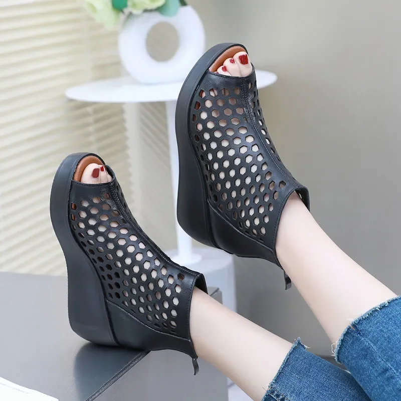 Black women's summer wedge sandals with perforated design, luxury urban footwear